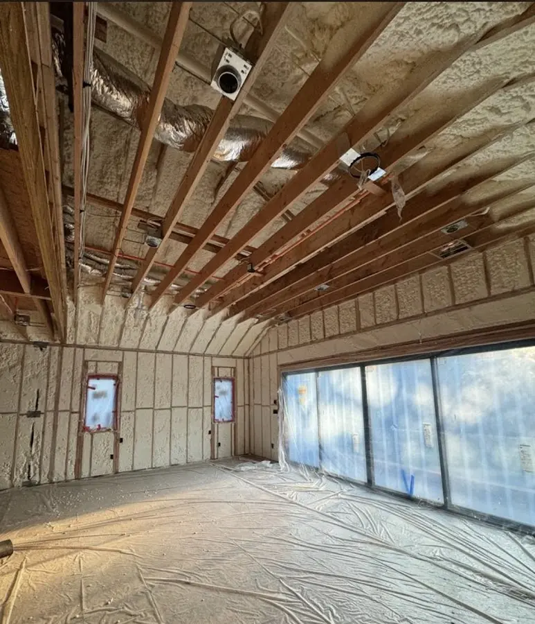 Interior walls and ceiling insulated with spray foam during new construction in Kenton